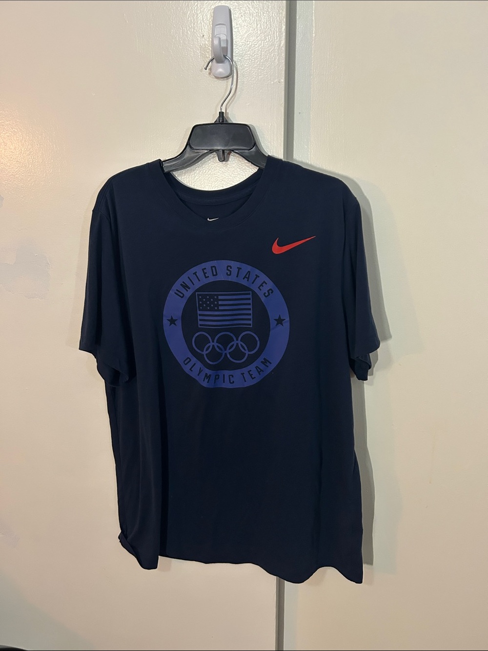 Nike Navy Short-Sleeve Olympic Team Graphic Tee with Red Swoosh